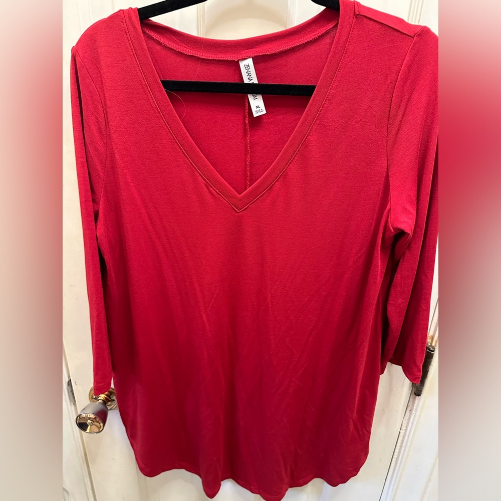 Red three quarter length top